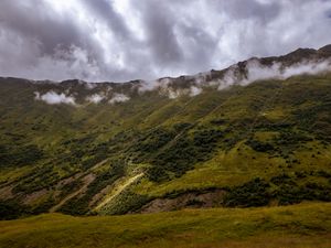Preview wallpaper slope, relief, grass, trees, clouds, sky