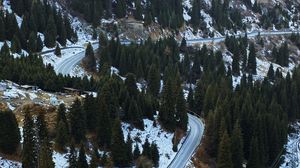 Preview wallpaper slope, road, trees, snow, aerial view