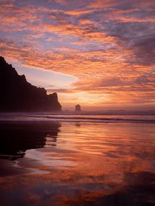 Preview wallpaper slope, rocks, sunset, sea, clouds, reflection