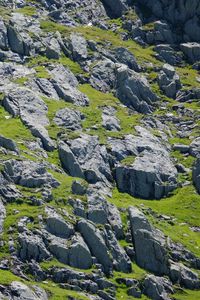 Preview wallpaper slope, stones, grass, relief