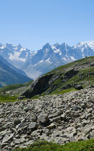 Preview wallpaper slope, stones, mountains, grass