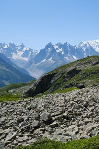 Preview wallpaper slope, stones, mountains, grass