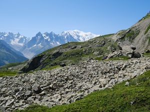 Preview wallpaper slope, stones, mountains, grass