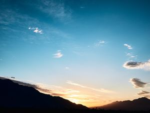 Preview wallpaper slope, sunset, sky, clouds
