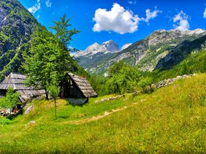 Preview wallpaper slovenia, mountains, grass, summer, sun