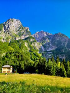 Preview wallpaper slovenia, mountains, lodges, meadow, green, brightly, sky, blue, clearly