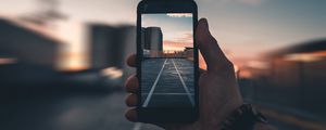 Preview wallpaper smartphone, hand, photo, blur