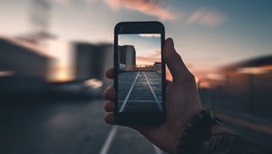 Preview wallpaper smartphone, hand, photo, blur