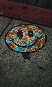 Preview wallpaper smile, colorful, asphalt, paint, graffiti