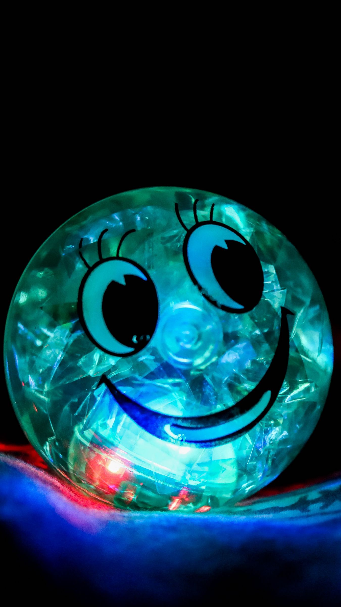 1350x2400 Wallpaper smile, happiness, ball, backlight