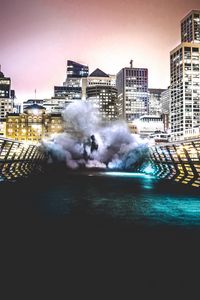 Preview wallpaper smoke, city, man, night, building, bridge