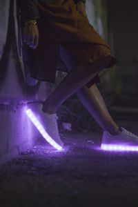 Preview wallpaper sneakers, glow, legs, purple