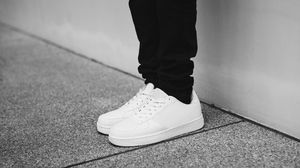 Preview wallpaper sneakers, legs, bw, minimalism