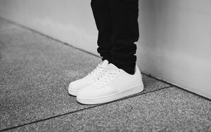 Preview wallpaper sneakers, legs, bw, minimalism