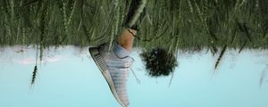 Preview wallpaper sneakers, legs, grass, field, sky