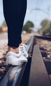 Preview wallpaper sneakers, legs, railway