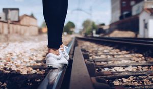 Preview wallpaper sneakers, legs, railway