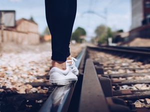 Preview wallpaper sneakers, legs, railway