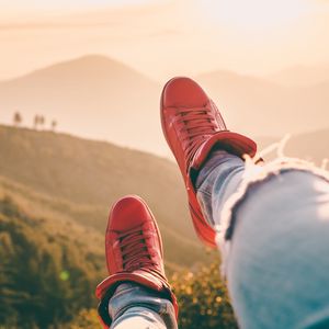 Preview wallpaper sneakers, legs, red, mountains