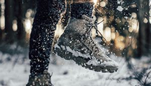 Preview wallpaper sneakers, legs, snow, snowflakes