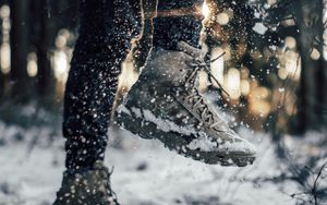 Preview wallpaper sneakers, legs, snow, snowflakes