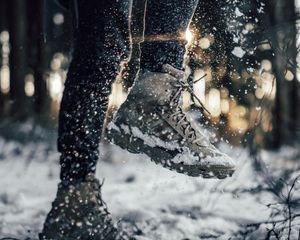 Preview wallpaper sneakers, legs, snow, snowflakes
