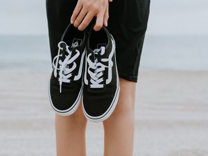 Preview wallpaper sneakers, shoes, black, girl, beach