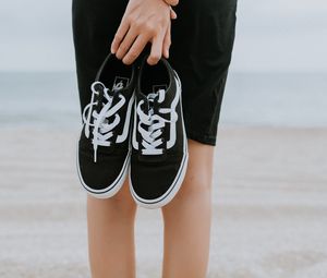 Preview wallpaper sneakers, shoes, black, girl, beach