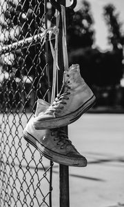 Preview wallpaper sneakers, shoes, bw, mesh, fence