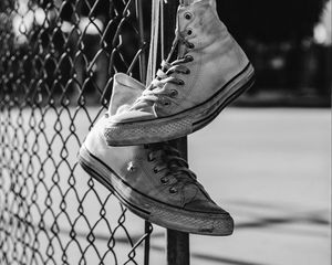 Preview wallpaper sneakers, shoes, bw, mesh, fence
