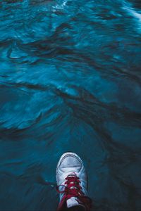 Preview wallpaper sneakers, water, feet, sea, current