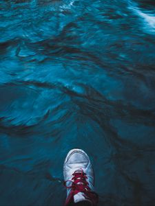 Preview wallpaper sneakers, water, feet, sea, current