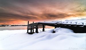 Preview wallpaper snow, building, winter, clouds