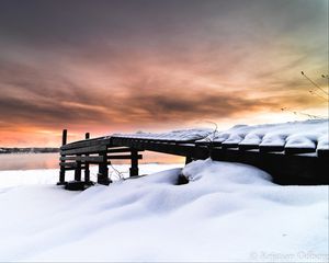 Preview wallpaper snow, building, winter, clouds