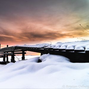 Preview wallpaper snow, building, winter, clouds