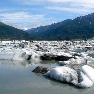 Preview wallpaper snow, coast, water, mountains