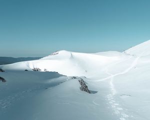 Preview wallpaper snow, hills, footprints, winter