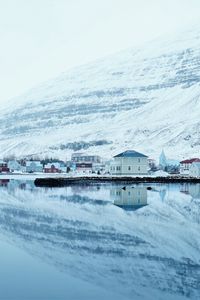 Preview wallpaper snow, hills, river, buildings