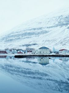 Preview wallpaper snow, hills, river, buildings