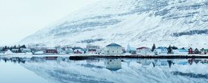 Preview wallpaper snow, hills, river, buildings