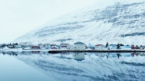 Preview wallpaper snow, hills, river, buildings