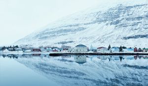 Preview wallpaper snow, hills, river, buildings