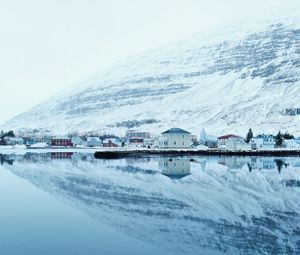 Preview wallpaper snow, hills, river, buildings