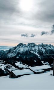 Preview wallpaper snow, mountains, peaks, buildings