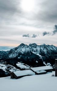 Preview wallpaper snow, mountains, peaks, buildings