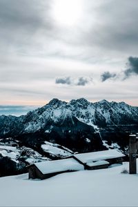 Preview wallpaper snow, mountains, peaks, buildings