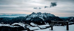 Preview wallpaper snow, mountains, peaks, buildings