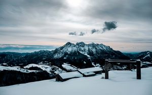 Preview wallpaper snow, mountains, peaks, buildings