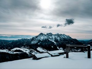 Preview wallpaper snow, mountains, peaks, buildings
