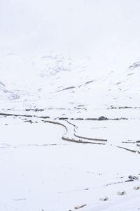 Preview wallpaper snow, mountains, road, winter, white